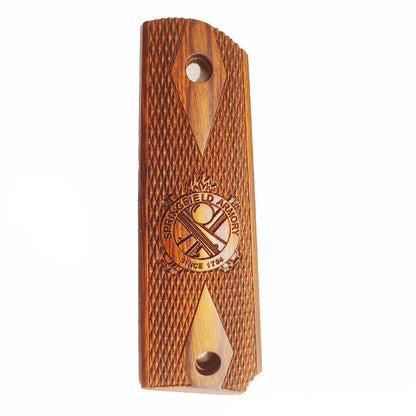 Close-up of checkered Cocobolo wood 1911 grips with Springfield Crossed Cannon logo