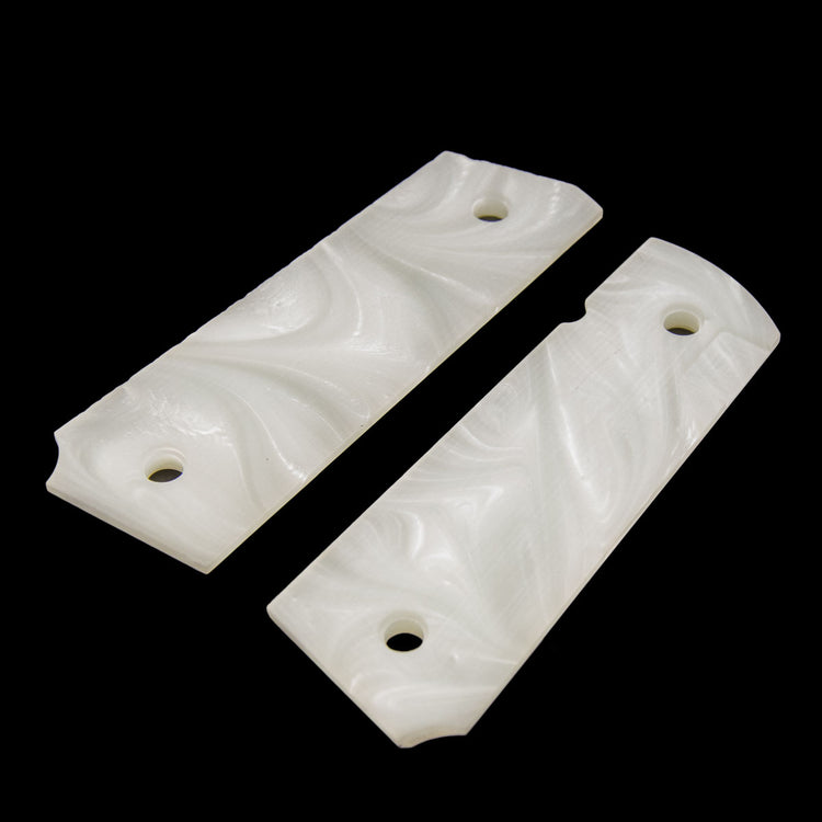 Polished white pearl 1911 grips shown from rear angle
